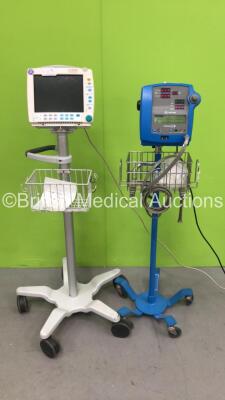 1 x GE Dinamap Pro 300 Vital Signs Monitor on Stand with BP Hose and 1 x Datex-Ohmeda Patient Monitor on Stand (1 x Powers Up - 1 x Draws Power with Blank Screen)