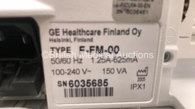 1 x GE Dinamap Pro 300 Vital Signs Monitor on Stand with BP Hose and 1 x Datex-Ohmeda Patient Monitor on Stand (1 x Powers Up - 1 x Draws Power with Blank Screen) - 5