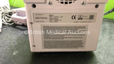 Mixed Lot Including 2 x Nellcor N-560 Pulse Oximeters with 2 x SpO2 Finger Sensors (Both Power Up) 1 x Tripp Lite UPS Unit (Powers Up) 1 x Medivators Scope Buddy Endoscope Flushing Aid with AC Power Supply (Powers Up) - 5