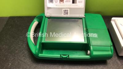 Mixed Lot Including 1 x Mediwatch PA-00262 Bardscan IIs Bladder Scanner with 1 x Battery (No Power Due to Possible Flat Battery with Damaged Lid Door-See Photo) 1 x Welch Allyn CP50 ECG Machine (Powers Up) *SN 109200501113, 02343* - 3