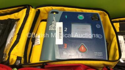 4 x Laerdal Heartstart FR2+ Defibrillators with 4 x Batteries, 4 x Skintact Electrodes, 1 x 3 Lead ECG Lead in Carry Bags (All Power Up and Pass Self Test) *SN 0307227346,0207226014,0207224363,1207266814* - 2