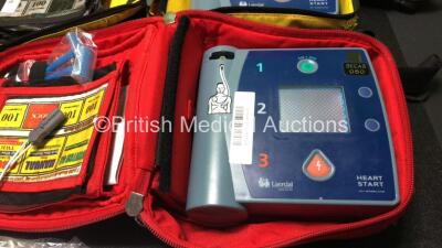 4 x Laerdal Heartstart FR2+ Defibrillators with 4 x Batteries, 4 x Skintact Electrodes, 1 x 3 Lead ECG Lead in Carry Bags (All Power Up and Pass Self Test) *SN 0307227346,0207226014,0207224363,1207266814* - 4