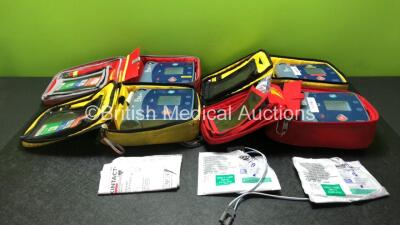 3 x Laerdal Heartstart FR2+ Defibrillators and 1 x Philips Heartstart FR2+ Defibrillators with 4 x Batteries and 3 x Skintact Electrodes in Carry Bags (All Power Up and Pass Self Test) *SN 0408274811,1207267095,1010990286,1007258754*