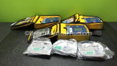 2 x Laerdal Heartstart FR2 Defibrillators and 1 x Philips FR2+ Heartstart Defibrillator with 3 x Batteries and 6 x Skintact Electrodes in Carry Bags (All Power Up and Pass Self Test) *SN 1010990288,0600006373,0900012338*