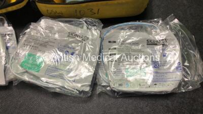 2 x Laerdal Heartstart FR2 Defibrillators and 1 x Philips FR2+ Heartstart Defibrillator with 3 x Batteries and 6 x Skintact Electrodes in Carry Bags (All Power Up and Pass Self Test) *SN 1010990288,0600006373,0900012338* - 4