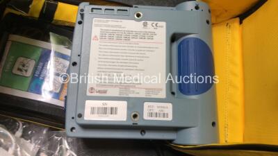 2 x Laerdal Heartstart FR2 Defibrillators and 1 x Philips FR2+ Heartstart Defibrillator with 3 x Batteries and 6 x Skintact Electrodes in Carry Bags (All Power Up and Pass Self Test) *SN 1010990288,0600006373,0900012338* - 5