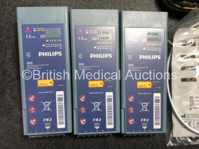 2 x Laerdal Heartstart FR2 Defibrillators and 1 x Philips FR2+ Heartstart Defibrillator with 3 x Batteries and 6 x Skintact Electrodes in Carry Bags (All Power Up and Pass Self Test) *SN 1010990288,0600006373,0900012338* - 7