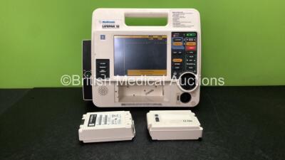 Medtronic Lifepak 12 Biphasic Defibrillator Including Pacer and Printer Options with 3 x Batteries (Powers Up when Tested with Stock Batteries-Batteries Included are Flat, Missing Printer Module-See Photo)