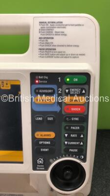 Medtronic Lifepak 12 Biphasic Defibrillator Including Pacer and Printer Options with 3 x Batteries (Powers Up when Tested with Stock Batteries-Batteries Included are Flat, Missing Printer Module-See Photo) - 3