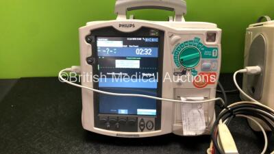 2 x Philips MRx Defibrillators Including Pacer, ECG and Printer Options with , 1 x SpO2 Finger Sensor, 1 x 3 Lead ECG Lead, 2 x Paddle Leads, 1 x Covidien Electrode Pads 2 x Philips M3538A Batteries and 2 x Philips M3539A Batteries (Both Power Up) - 2