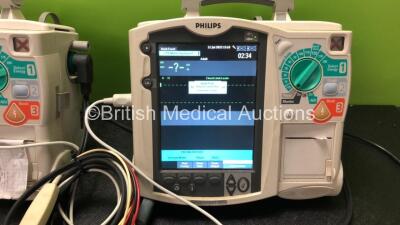 2 x Philips MRx Defibrillators Including Pacer, ECG and Printer Options with , 1 x SpO2 Finger Sensor, 1 x 3 Lead ECG Lead, 2 x Paddle Leads, 1 x Covidien Electrode Pads 2 x Philips M3538A Batteries and 2 x Philips M3539A Batteries (Both Power Up) - 3