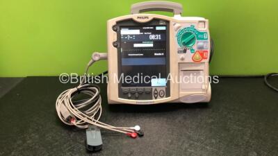 Philips MRx Defibrillator Including Pacer, ECG and Printer Options with 1 x Paddle Lead, 1 x 3 Lead ECG Lead, 1 x Philips M3538A Battery and 1 x Philips M3539A Battery (Powers Up)