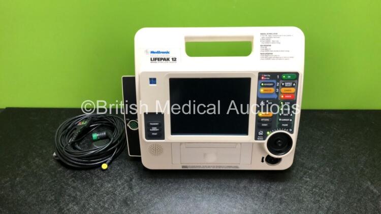 Medtronic Lifepak 12 Biphasic Defibrillator / Monitor with Pacer, 2 x Batteries and 1 x Physio Control 3 Lead ECG Lead (Powers Up with Blank Screen)