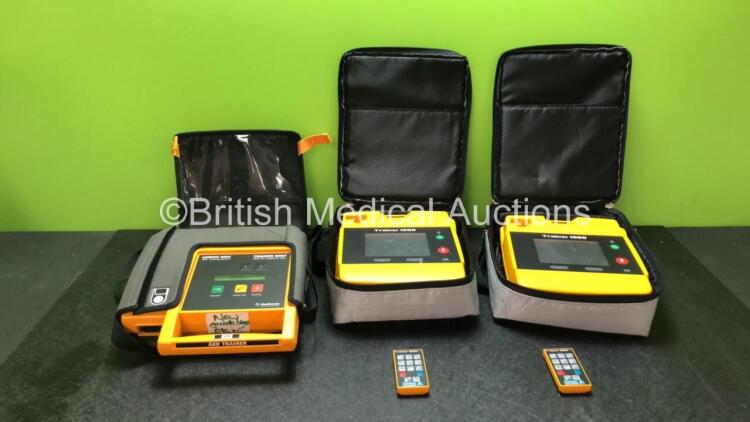 2 x Trainer 1000 Defibrillators (Both No Power) 1 x Lifepak 550T Defibrillator (Powers Up)