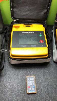 2 x Trainer 1000 Defibrillators (Both No Power) 1 x Lifepak 550T Defibrillator (Powers Up) - 2