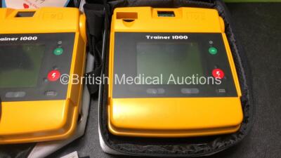 3 x Trainer 1000 Defibrillators with 1 x Power Supply and 1 x Electrode (3 x No Power) - 2