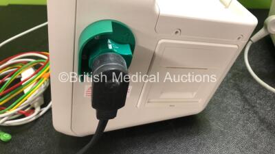 2 x Philips Efficia DFM100 Defibrillators *Mfd - 2019 / 2019* with ECG and Printer Options Including 2 x 3 Lead ECG Leads, 2 x Paddle Leads and 2 x Philips Rechargeable Li-ion Battery Packs (Both Power Up) - 6