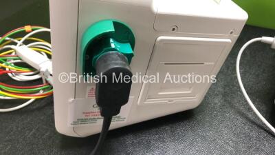 2 x Philips Efficia DFM100 Defibrillators *Mfd - 2019 / 2019* with ECG and Printer Options Including 2 x 3 Lead ECG Leads, 2 x Paddle Leads and 2 x Philips Rechargeable Li-ion Battery Packs (Both Power Up) - 3