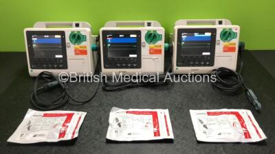 3 x Philips Heartstart XL+ Defibrillators Including ECG and Printer Options with 3 x Paddle Leads, 3 x Philips Multifunction Electrode Pads *2 Expired, 1 in Date* and 3 x Batteries (All Power Up)