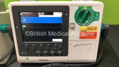 3 x Philips Heartstart XL+ Defibrillators Including ECG and Printer Options with 3 x Paddle Leads, 3 x Philips Multifunction Electrode Pads *2 Expired, 1 in Date* and 3 x Batteries (All Power Up) - 4