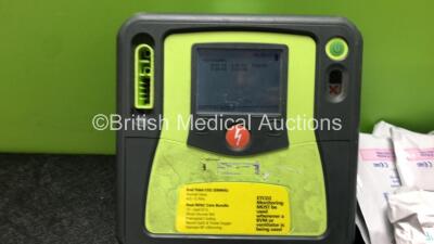 Zoll AED Pro Defibrillator with 3 Lead ECG Lead and Various Expired Electrodes (Powers Up with Stock Battery, Battery Not Included, Scratched Screen - See Photo) - 2