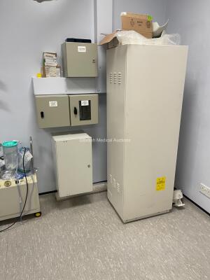 GE Proteus X-Ray Bucky Suite (2021 Tube) Including Elevating Table, Overhead Bucky OTS Assembly, X-ray Wall Stand, System Cabinet, Ceiling Rails and Operator Console. System has been Professionally Removed; System Sold as Non-Working Due to Tube Pivot Fau - 7
