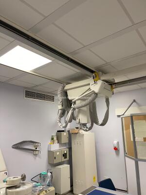 GE Proteus X-Ray Bucky Suite (2021 Tube) Including Elevating Table, Overhead Bucky OTS Assembly, X-ray Wall Stand, System Cabinet, Ceiling Rails and Operator Console. System has been Professionally Removed; System Sold as Non-Working Due to Tube Pivot Fau - 21