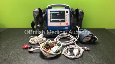 Zoll X Series Monitor/Defibrillator Including ECG, SPO2, NIBP, CO2 and Printer Options with 1 x Sure Power II Battery, 1 x NIBP Cuff and Hose, 1 x 4 Lead ECG Lead, 1 x 6 Lead ECG Lead, 1 x Paddle Lead and 1 x SPO2 Finger Sensor in Carry Bag (Powers Up and