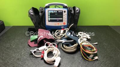 Zoll X Series Monitor/Defibrillator Including ECG, SPO2, NIBP, CO2 and Printer Options with 1 x Sure Power II Battery, 1 x NIBP Cuff and Hose, 1 x 4 Lead ECG Lead, 1 x 6 Lead ECG Lead, 1 x Paddle Lead and 1 x SPO2 Finger Sensor in Carry Bag (Powers Up and