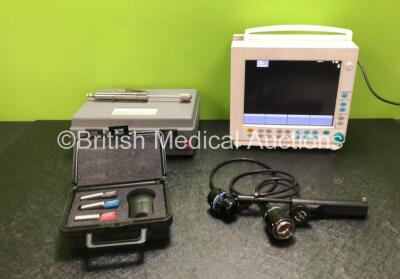 Mixed Lot Including 1 x Olympus OVC-200 Lecture Scope Attachment, 1 x Scandimed Lithotripsy Handle in Case, 1 x BC Biomedical FingerSim Pulse Oximeter Test System (1 x Damaged FingerSim - See Photos) and 1 x GE Type F-CM1-04 Patient Monitor (Powers Up) *S