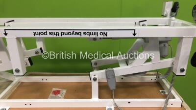 1 x Bristol Maid Electric Patient Examination Couch with Controller (Powers Up) and 1 x Unknown Make of Electric Patient Examination Couch with Controller (Powers Up) - 3