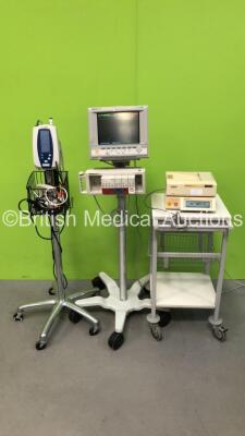 Mixed Lot Including 1 x Welch Allyn Spot Vital Signs Monitor on Stand with 1 x AC Power Supply, 1 x Hewlett Packard Viridia 24C Patient Monitor and 1 x Oxford Medical Sonicaid Team Fetal Monitor with 1 x Trigger on Stand (All Power Up)