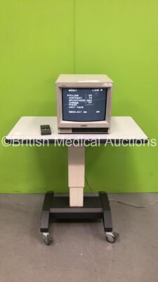 Sony Trinitron Monitor with Controller on Table (Powers Up)