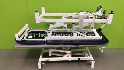 1 x Bristol Mid Electric Patient Couch with Controller (Powers Up) 1 x Medi Plinth Hydraulic Patient Couch (Hydraulics Tested Working)