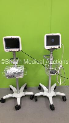 2 x GE Dash 4000 Patient Monitors on Stands with BP1/2, BP 2/4, SPO2, Temp/Co, NBP and ECG Options (Both Power Up) *S/N SD010501774GA / SHQ12076249SA*