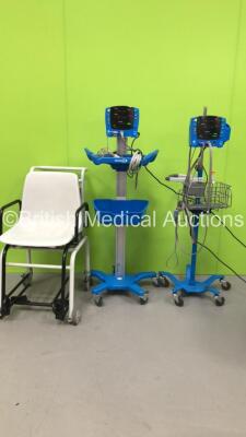 2 x GE Dinamap Carescape V100 Vital Signs Monitors on Stands with BP Hoses and SPO2 Finger Sensors (Both Power Up) and 1 x Seca Wheelchair Weighing Scales