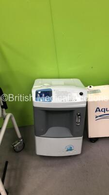 1 x Seca Wheelchair Weighing Scales, 1 x OxyLife Oxygen Concentrator (1 x Missing Wheel) and 1 x Fresenius AquaUNO Water Treatment System (Powers Up) - 3