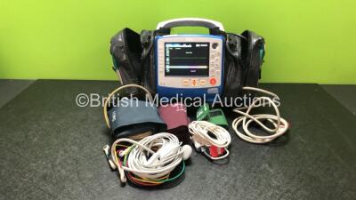 Zoll X Series Monitor/Defibrillator Including ECG, SPO2, NIBP, CO2 and Printer Options with 1 x Sure Power II Battery, 1 x NIBP Cuff and Hose, 1 x 4 Lead ECG Lead, 1 x 6 Lead ECG Lead, 1 x Paddle Lead and 1 x SPO2 Finger Sensor in Carry Bag (Powers Up and