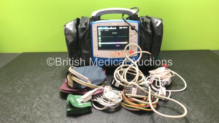 Zoll X Series Monitor/Defibrillator Including ECG, SPO2, NIBP, CO2 and Printer Options with 1 x Sure Power II Battery, 1 x NIBP Cuff and Hose, 1 x 4 Lead ECG Lead, 1 x 6 Lead ECG Lead, 1 x Paddle Lead and 1 x SPO2 Finger Sensor in Carry Bag (Powers Up and