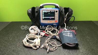 Zoll X Series Monitor/Defibrillator Including ECG, SPO2, NIBP, CO2 and Printer Options with 1 x Sure Power II Battery, 1 x NIBP Cuff and Hose, 1 x 4 Lead ECG Lead, 1 x 6 Lead ECG Lead, 1 x Paddle Lead and 1 x SPO2 Finger Sensor in Carry Bag (Powers Up and