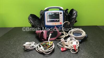 Zoll X Series Monitor/Defibrillator Including ECG, SPO2, NIBP, CO2 and Printer Options with 1 x Sure Power II Battery, 1 x NIBP Cuff and Hose, 1 x 4 Lead ECG Lead, 1 x 6 Lead ECG Lead, 1 x Paddle Lead and 1 x SPO2 Finger Sensor in Carry Bag (Powers Up and