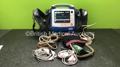 Zoll X Series Monitor/Defibrillator Including ECG, SPO2, NIBP, CO2 and Printer Options with 1 x Sure Power II Battery, 1 x NIBP Cuff and Hose, 1 x 4 Lead ECG Lead, 1 x 6 Lead ECG Lead, 1 x Paddle Lead and 1 x SPO2 Finger Sensor in Carry Bag (Powers Up and