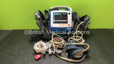 Zoll X Series Monitor/Defibrillator Including ECG, SPO2, NIBP, CO2 and Printer Options with 1 x Sure Power II Battery, 1 x NIBP Cuff and Hose, 1 x 4 Lead ECG Lead, 1 x 6 Lead ECG Lead, 1 x Paddle Lead and 1 x SPO2 Finger Sensor in Carry Bag (Powers Up and