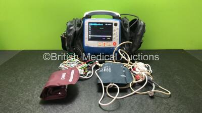 Zoll X Series Monitor/Defibrillator Including ECG, SPO2, NIBP, CO2 and Printer Options with 1 x Sure Power II Battery, 1 x NIBP Cuff and Hose, 1 x 4 Lead ECG Lead, 1 x 6 Lead ECG Lead, 1 x Paddle Lead and 1 x SPO2 Finger Sensor in Carry Bag (Powers Up and