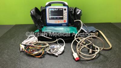 Zoll X Series Monitor/Defibrillator Including ECG, SPO2, NIBP, CO2 and Printer Options with 1 x Sure Power II Battery, 1 x NIBP Cuff and Hose, 1 x 4 Lead ECG Lead, 1 x 6 Lead ECG Lead, 1 x Paddle Lead and 1 x SPO2 Finger Sensor in Carry Bag (Powers Up and