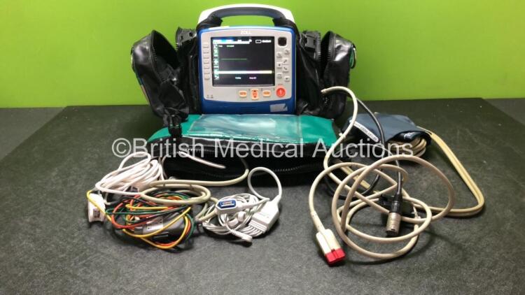 Zoll X Series Monitor/Defibrillator Including ECG, SPO2, NIBP, CO2 and Printer Options with 1 x Sure Power II Battery, 1 x NIBP Cuff and Hose, 1 x 4 Lead ECG Lead, 1 x 6 Lead ECG Lead, 1 x Paddle Lead and 1 x SPO2 Finger Sensor in Carry Bag (Powers Up and