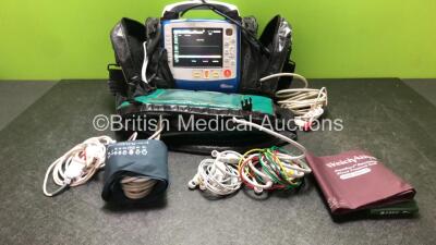 Zoll X Series Monitor/Defibrillator Including ECG, SPO2, NIBP, CO2 and Printer Options with 1 x Sure Power II Battery, 1 x NIBP Cuff and Hose, 1 x 4 Lead ECG Lead, 1 x 6 Lead ECG Lead, 1 x Paddle Lead and 1 x SPO2 Finger Sensor in Carry Bag (Powers Up and