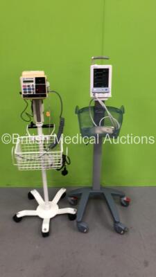 1 x CSI Criticare Vital Care 506DXN Vital Signs Monitor on Stand and 1 x Datascope Duo Vital Signs Monitor on Stand (Both Power Up) *S/N MD04862-B7*