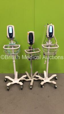 3 x Welch Allyn SPOT Vital Signs Monitors on Stands (All Power Up) *S/N 104940 / 107787 / 102575*