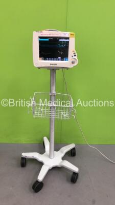 Philips MP30 Patient Monitor on Stand with Philips IntelliVue X2 Patient Monitor with Press, Temp, NBP, SPo2 and ECG/Resp Options (Powers Up - Damaged Unit - See Pictures)